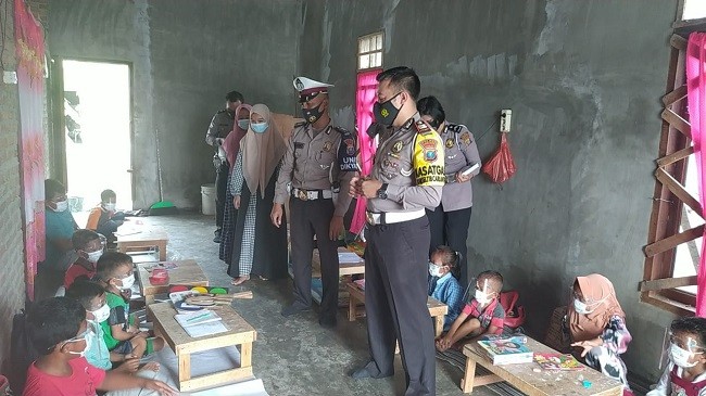 Satlantas Sergai Sosialisasikan Bahaya Covid-19 ke Anak Sekolah