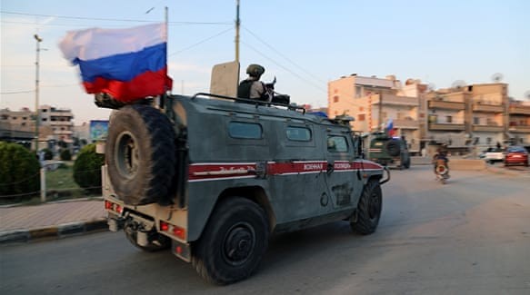 Mobil Militer dan Helikopter Rusia Kepung Kendaraan Amerika