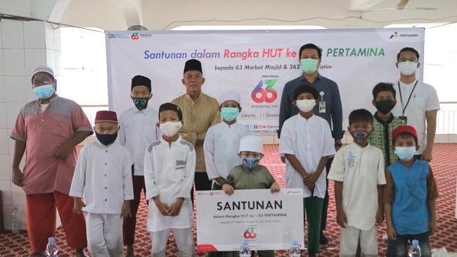 Berbagi Kebahagiaan, Pertamina Beri Santunan kepada 63 Marbot Masjid dan 363 Anak Yatim